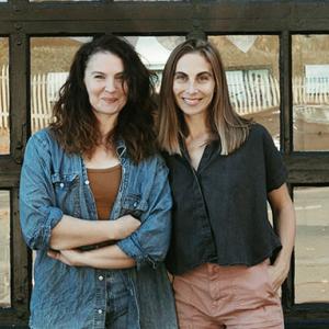 Dancers standing in front of studio.