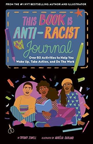 Three brown skinned teens sit cross legged on the floor with books.