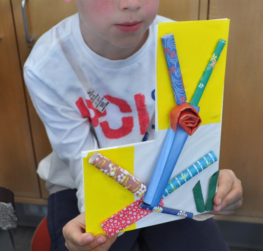 rolled paper relief sculpture by child